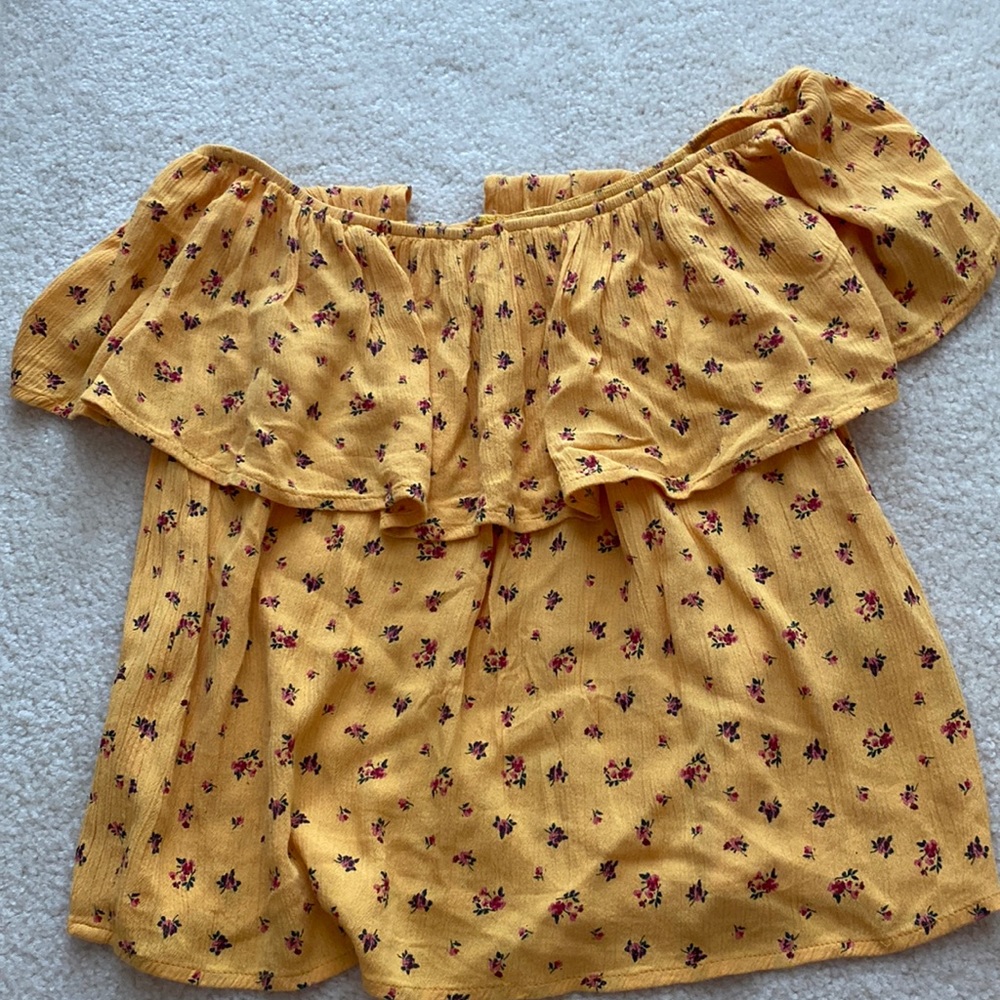Hollister Women’s top on size Small. Yellow with flower details.